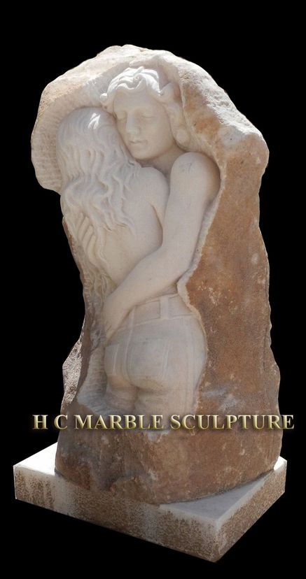 Unique Sculpture Figures Of Couple Carved Inside Rock.