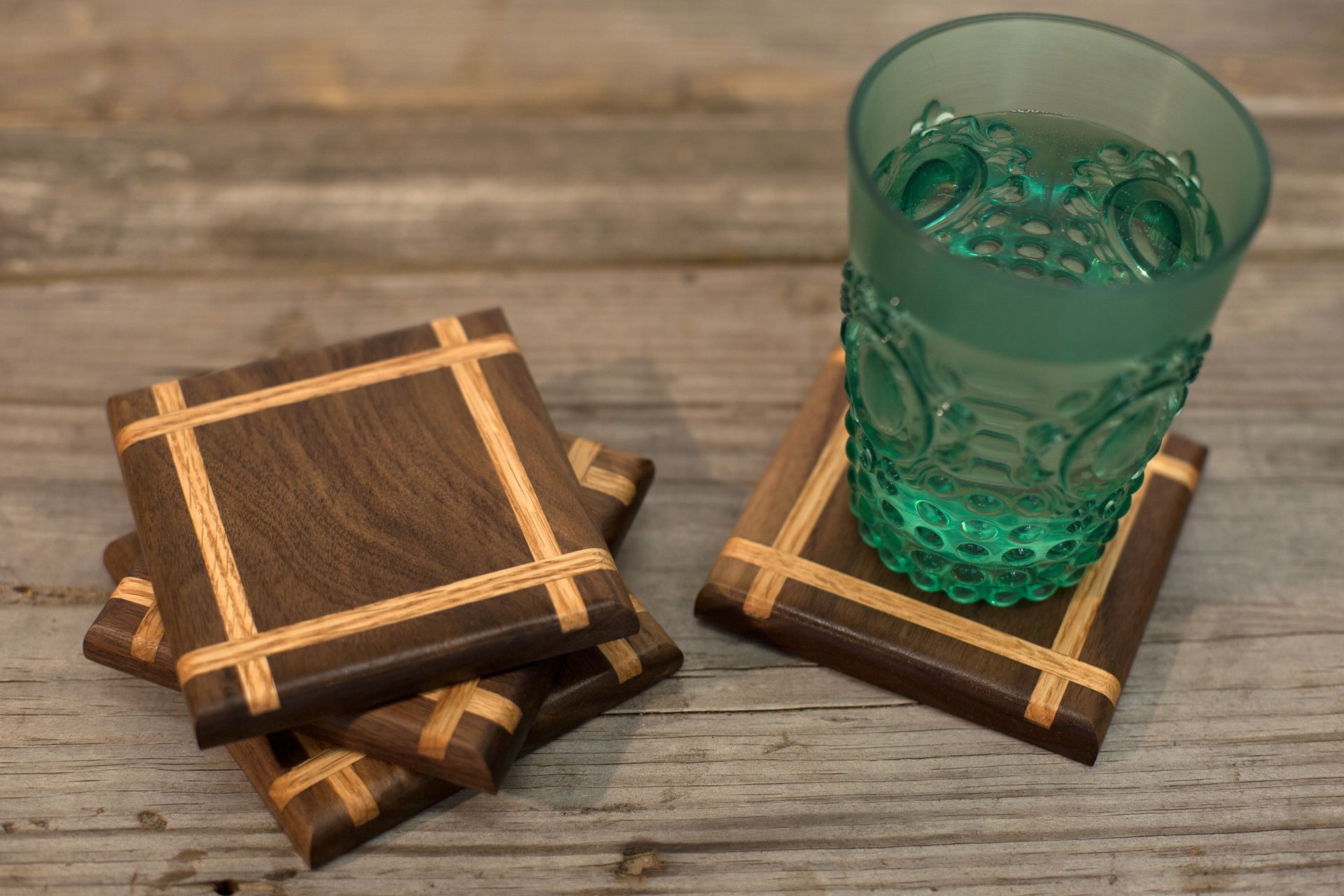 Set Of 4 Walnut Coasters With Red Oak Inlay