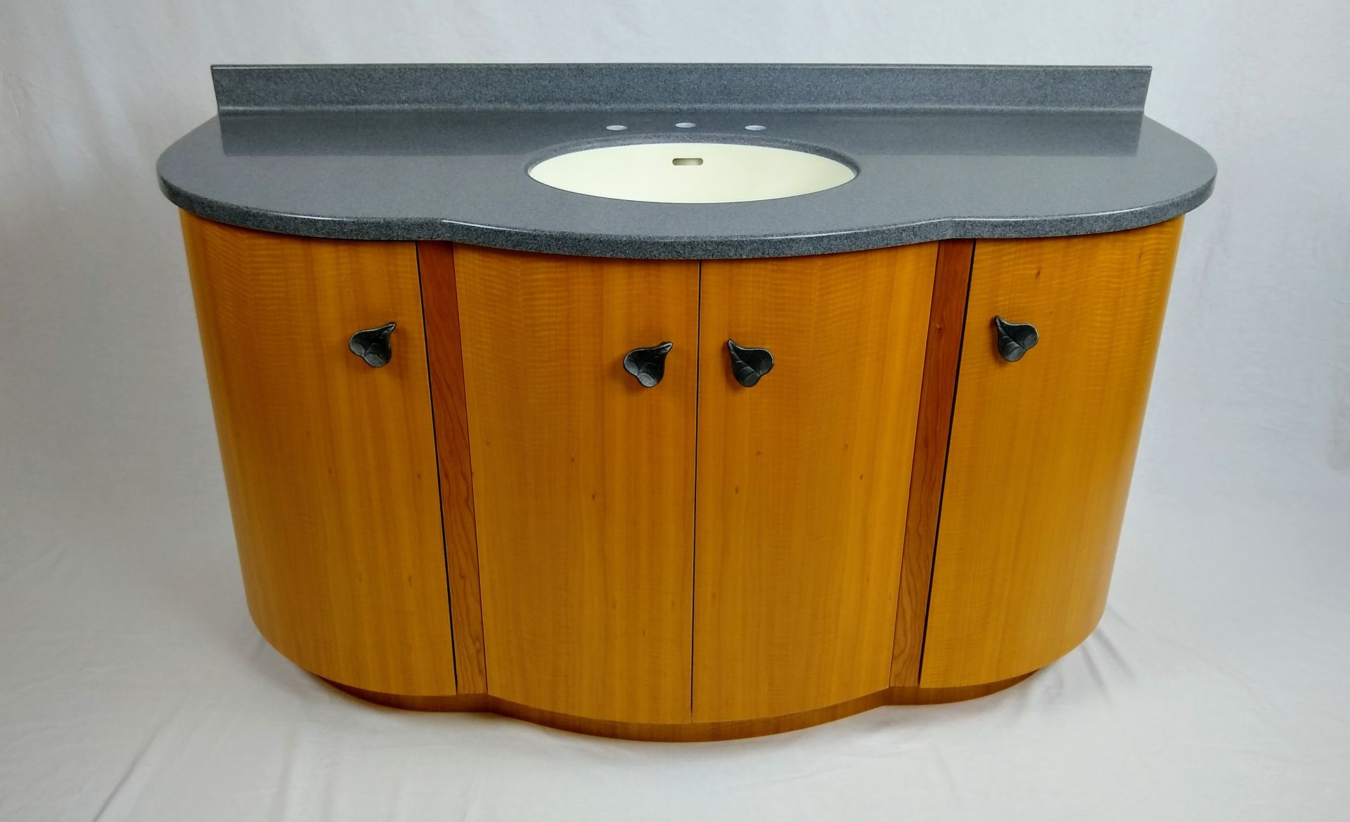 Custom African Anigre Curved Vanity With Solid Surface Sink And Counter Top