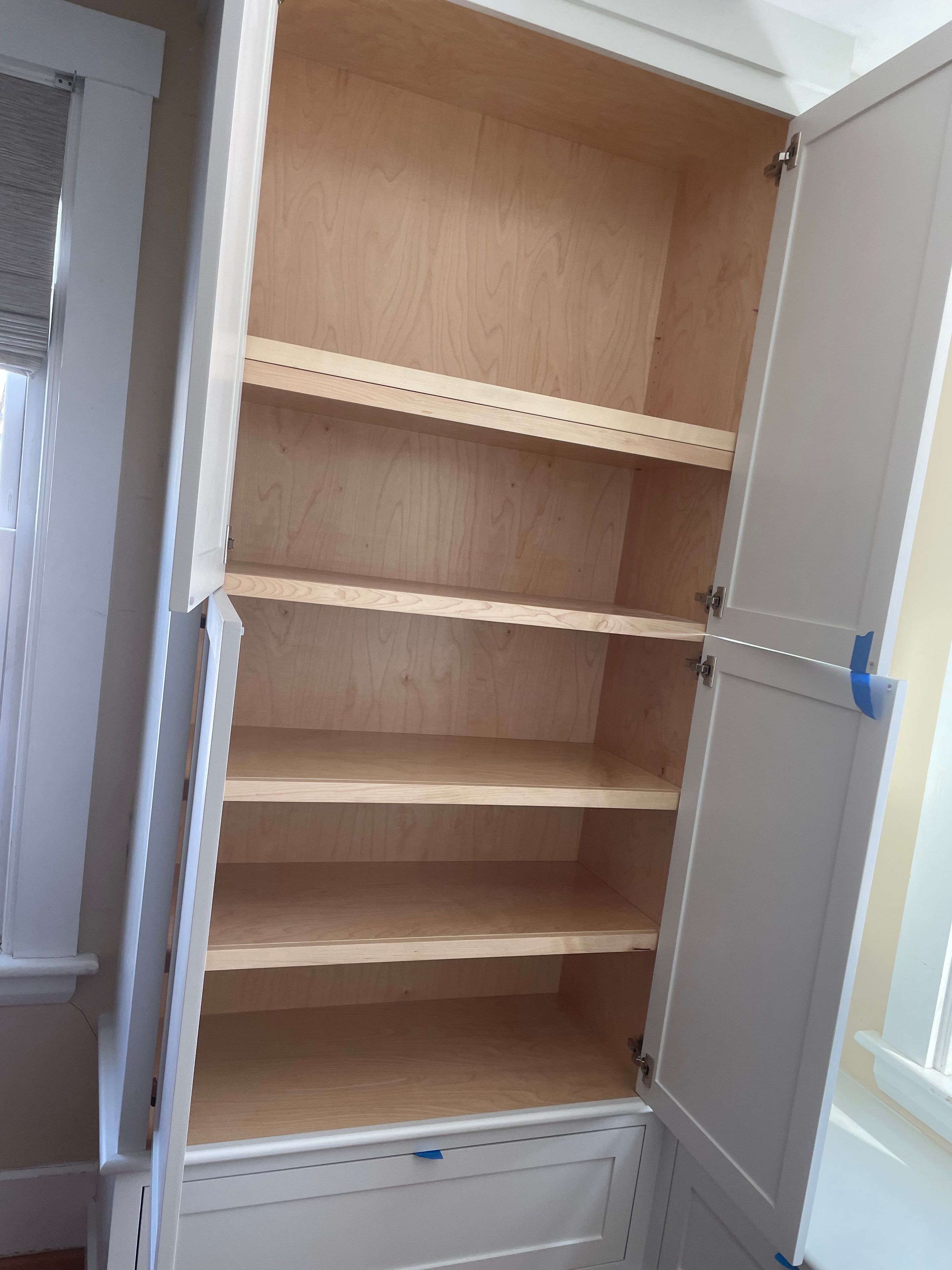 Custom nook bench with pullout drawers and armoire with shelving 2
